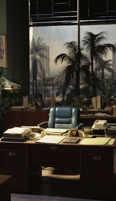 an office with a desk, chair and palm trees in the window sill behind it