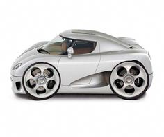 a silver sports car on a white background