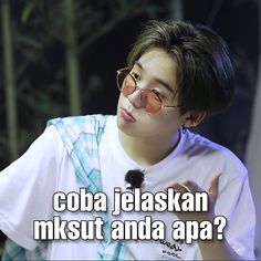 a young man wearing sunglasses and holding a microphone in front of him with the words cobra jelskan, musut and apa?