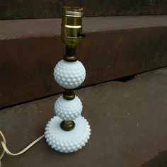 Vintage hobnail milk glass table or desk lamp . Lamp features 3 tiers of hobnail milk glass separated by metal columns. Made in the 1950s. Metal Columns, Lamps Vintage, Glass Table Lamps, Glass Table Lamp, The 1950s, Glass Table, Milk Glass, Desk Lamp, Table Lamp