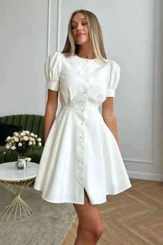 Non-stretch Knee-length Office Dress, Non-stretch Knee-length Dresses, Fitted Knee-length Dresses With Buttons, Chic Non-stretch Puff Sleeve Dresses, Mid-length White Mini Dress For Summer, White Mid-length Mini Dress For Summer, Fitted Solid Color Dress With Puff Sleeves, Solid Color Fitted Dress With Puff Sleeves, Fitted Solid Color Office Dresses