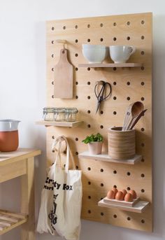 two pictures one has a wooden peg board and the other is a shelf with utensils on it