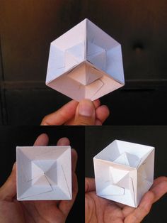 four different views of an origami cube being held in the palm of someone's hand