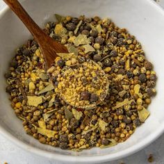 a wooden spoon in a bowl filled with cereal and other things to make it look like something out of the book