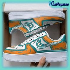 the nike air force 1 is painted with dolphins on it's upper half and bottom part