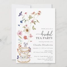 a bridal tea party with flowers and butterflies