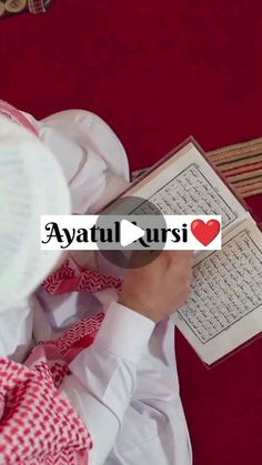 a person reading a book with the words'ayatl sursi'in front of them