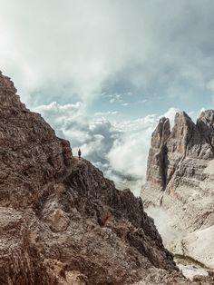 a person standing on top of a mountain