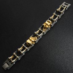 Description: Stainless steel black and 18K gold plated skull bracelet. Approx. Weight: 72 grams Available Sizes: 7", 8", 9", 10' Approx. Dimensions(mm): 20mm x 177.8mm(Length varies by SKU) Approx. Dimensions(Inches): 0.79" x 7"(Length varies by SKU) Bike Chain Bracelet, Steel Bike, Bike Chain, Jewelry Website, Stylish Bracelet, Skull Bracelet, Skull Design, Italian Charm Bracelet, Wholesale Jewelry