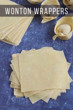 homemade wonton wrappers are sitting on a blue surface with the words, wonton wrappers