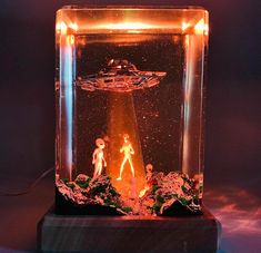 a glass block with an image of two people standing in front of a star trek scene