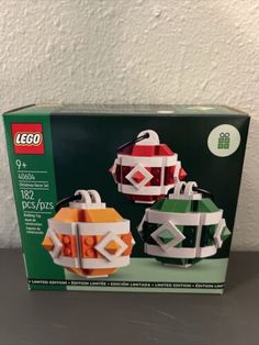 two legos are in the box and one is made out of plastic