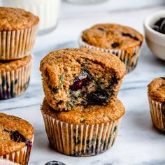 blueberry muffins are stacked on top of each other