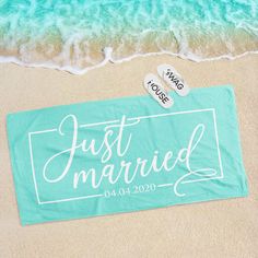 just married towel and flip flops on the beach