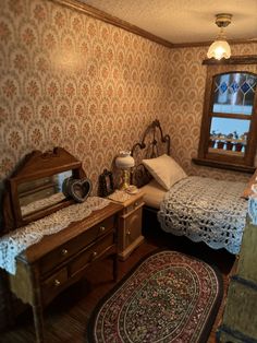 a bedroom with two beds and a dresser