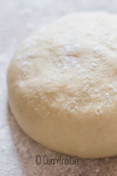 a ball of dough sitting on top of a table