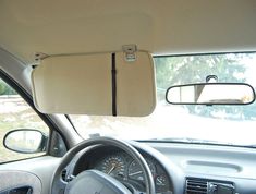 the interior of a car with dashboard and dash board