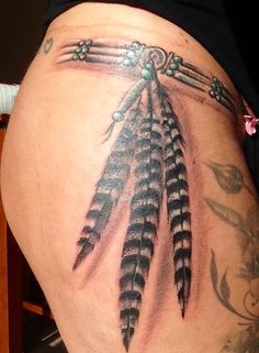 Native American feather tattoo Back Tattoo Women Native American, Indian Feather Tattoos Native Americans, Native American Armband Tattoo, Indegenious Tattoo, Native American Band Tattoo, Native Tattoo Ideas, Native American Indian Tattoo, Small Native American Tattoos, Native American Art Tattoo