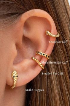 a woman's ear with three different types of piercings