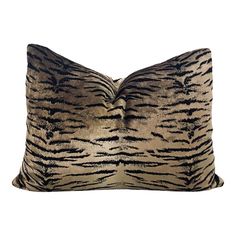 a zebra print pillow on a white background