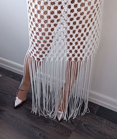 Beautiful macrame skirt with long fringe hanging throughout.  Perfect like Beach wedding skirt, bikini cover up, belly dancer skirt, skirt for the festivals outfit. Careful details and fun fringe make this a super cute cover up option for your perfect summer look. Hand wash cold or dry cleaning. Hang to dry. Materials: - cotton blend Available and in other colors, just contact me. Please, carefully choose the skirt length! (drop down menu). If you need other length or size, please contact me. -- Cute Coverups, Tassel Skirt, Macrame Dress, Wedding Skirt, Beach Skirt, Long Fringes, Fringe Skirt, Belly Dancers, Festival Outfit