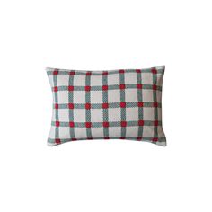 a white and red plaid pillow on a white background