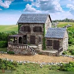 an image of a model house in the middle of some grass and rocks with stairs leading up to it