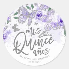 a round sticker with purple flowers and butterflies on it