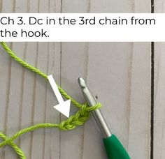 the crochet hook is being used to make an ornament