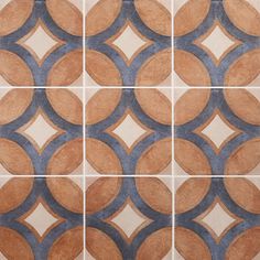 four tiles with circles on them in different sizes and colors, one is brown and the other is blue