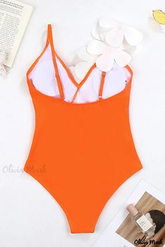 Olivia Mark - Stunning Sleeveless Swimsuit for Beachgoers Summer Backless One-piece With Lined Body, Summer Backless One Piece With Lined Body, Summer Backless One Pieces For Sunbathing, Solid Backless Bodysuit For Vacation, Vacation Bodysuit With Adjustable Straps, Sleeveless, Solid Color Backless Bodysuit For Vacation, Solid Summer Bodysuit With Spaghetti Straps, Vacation Sleeveless Bodysuit With Adjustable Straps, Sleeveless Bodysuit With Adjustable Straps For Vacation