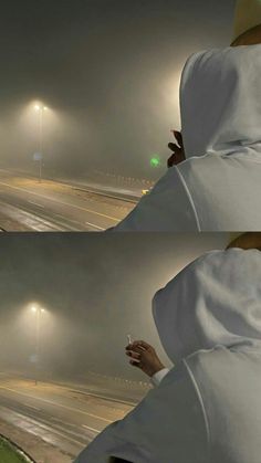 two images of a person in white hoodie holding a cell phone and looking at the street lights