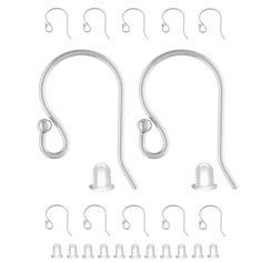 an assortment of fishing hooks and hooks on a white background with clippings for each hook