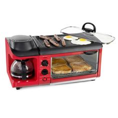 a red toaster oven filled with breakfast foods