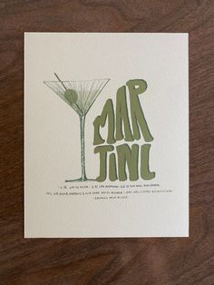 a card with the words car jam written in green ink and a martini glass next to it