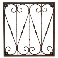 an iron gate with decorative designs on the top and bottom, isolated against a white background