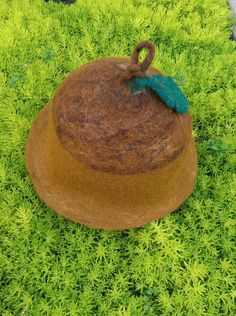 For those who are looking for an interesting hat for themselves or as a gift, then this is what you were looking for! The acorn hat was created by me from merino and sheep wool and viscose using the wet felting method by hand - only wool, water and soap. The width of the hat brim is 4-5  cm. The hat is made in such a way that it resembles an acorn. The top of the hat is decorated with an oak leaf and a loop that allows you to hang the hat on a hook. The hat is soft, does not prickle at all and r Handmade Brown Felt Hat For Festival, Acorn Hat, Adjustable Brown Wool Felt Hat, Forest Witch Hat, Wool Felted Witch Hat, Sauna Hat, Wet Felting Hat, Elf Hat, Wet Felt