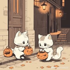 two cats are holding pumpkins on the steps