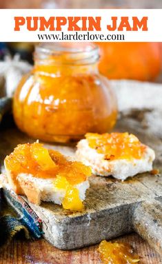 there is a small piece of bread with orange jam on it and the rest of the bread has been cut in half