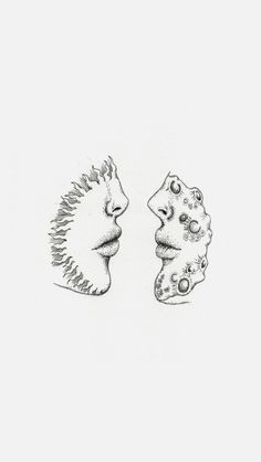 an image of two people facing each other with faces drawn in ink on pink paper