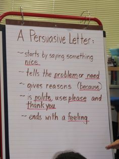 a person standing in front of a white board with writing on it that says a persuasie letter starts by saying something nice