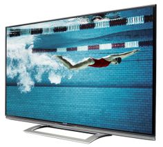 an image of a man swimming in the pool on tv screen with water splashing