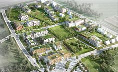 an aerial view of a green city with lots of trees and grass on the ground