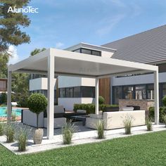 a house with a pool in the front yard and covered patio area next to it