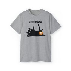 The overall effect of the design is one of surprise and humor. The cat's surprised expression is juxtaposed with the pumpkin's surprised expression, creating a sense of comic incongruity. The text "meeeeowww" adds to the humor of the design, as it suggests that the cat is saying "meow" in surprise, or is it in pleasure? This unisex ultra cotton tee is a classic. Quality cotton construction means that designs are sure to shine. The shoulders are tapped for a good upper-body fit. There are no side Surprised Expression, Chat Halloween, Cat Meow, Cat Shirt, Crazy Cat, Cats Meow, Cat Shirts, Halloween Cat, Crazy Cats