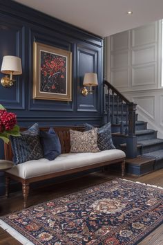 a living room filled with furniture and a rug