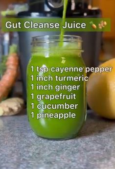 a green smoothie in a mason jar with instructions on how to make it