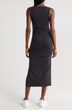 This essential midi dress is so versatile you can wear it over your swimwear during the day and out to dinner later. The deep neckline and the side slits give it breezy wearability so you can wear it again and again. 46" length (size Medium) Slips on over head V-neck Sleeveless Side slits Unlined 94% lyocell, 6% elastane Machine wash, tumble dry Made in the USA of imported fabric Black Elastane Midi Dress For Summer, Summer Midi Dress For Night Out With Ruched Back, Summer Midi Dress With Ruched Back For Night Out, Summer Black Midi Dress, Bodycon Midi Dress With Side Slits For Summer, Longline Midi Dress With Side Slits For Night Out, Sleek Stretch Ruched Midi Dress, Elastane Midi Dress With Side Slits, Sleek Summer Midi Dress With Flattering Silhouette