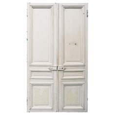 an old white double door is open on a white background