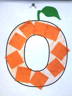 the letter o is made out of construction paper